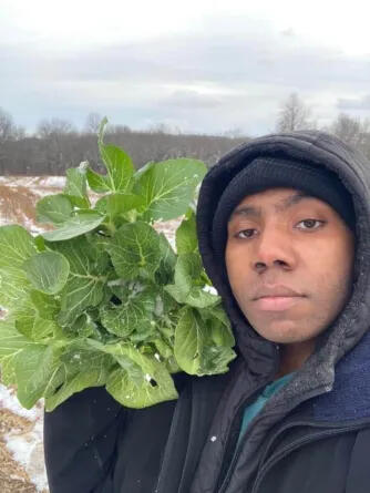 Harvesting some fresh greens in the snow.